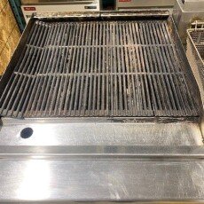 Used Restaurant Equipment Therma-Tek 24" Natural Gas Charbroiler on a work stand TC24-CL