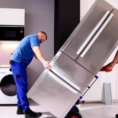 White Glove Delivery Service with 2 Men Uncrating, Unpacking, and Placing Equipment Inside the Business Location